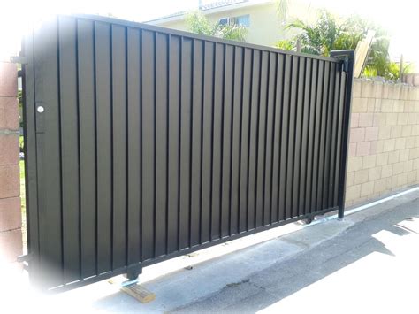 iron gate with sheet metal|steel driveway entry gates.